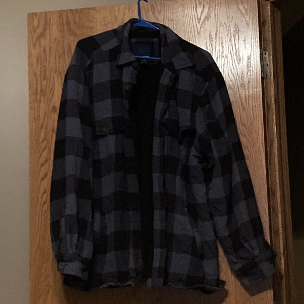 Fleece and flannel button up shirt.  Like brand new.